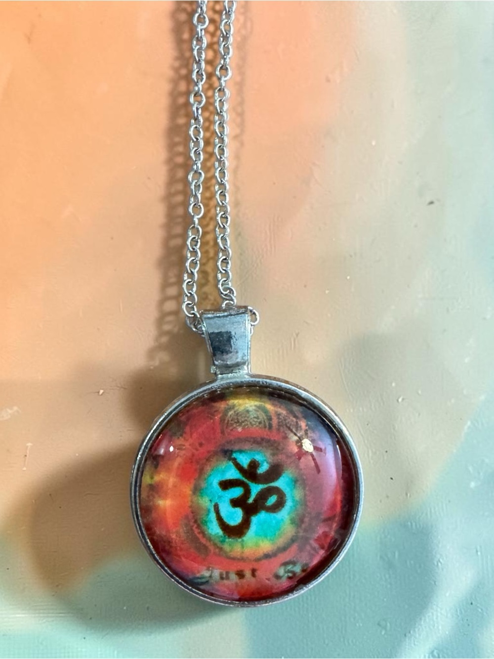 Silver-Tone Red & Turquoise Om Symbol Pendant Necklace